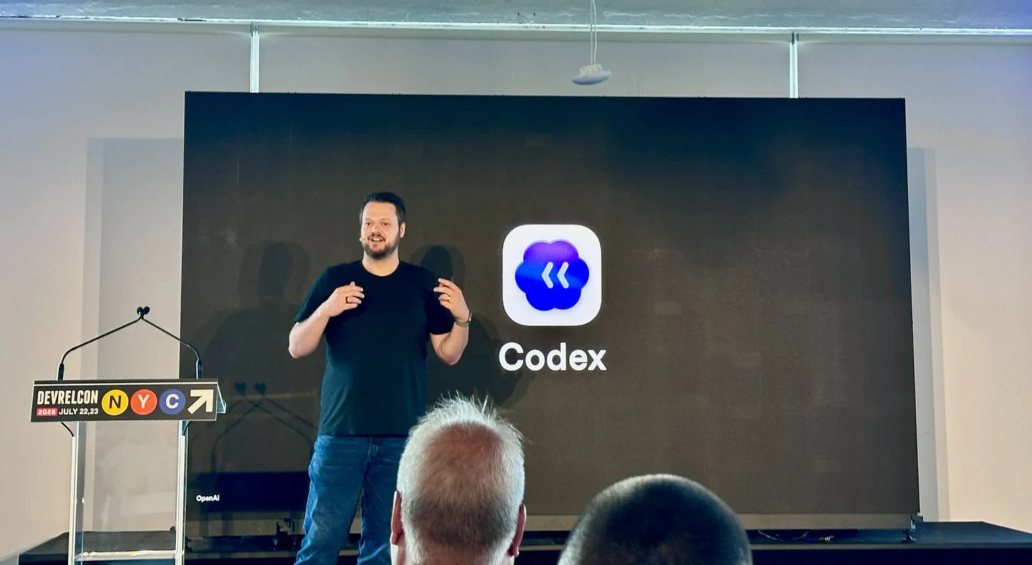 Dominik Kundel presenting on stage at DevRelCon New York 2026, with the OpenAI Codex logo displayed behind him.