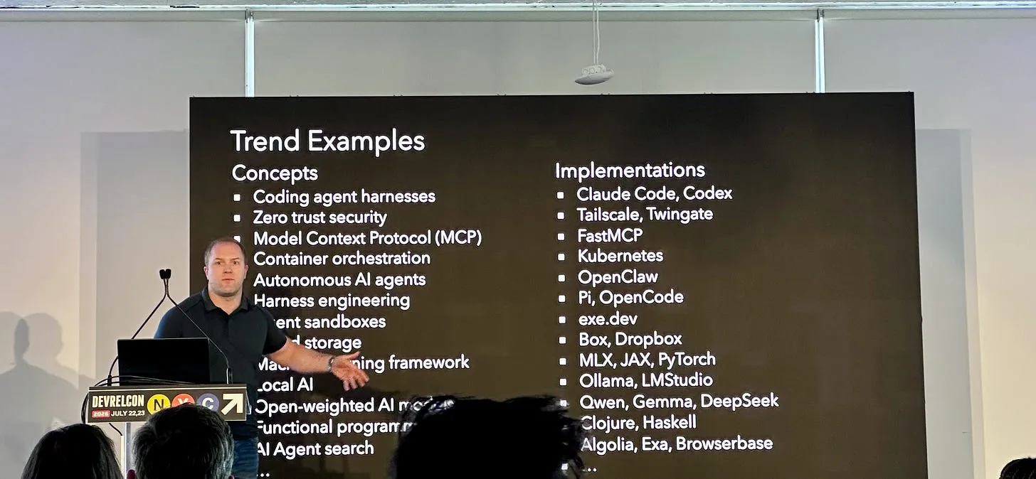 Matthew Makai presenting a framework for evaluating technical trends on stage.